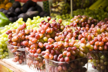 organic grapes on display at the sf farmer's market.