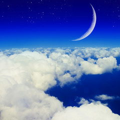 Obraz na płótnie Canvas Blue sky, clouds and moon
