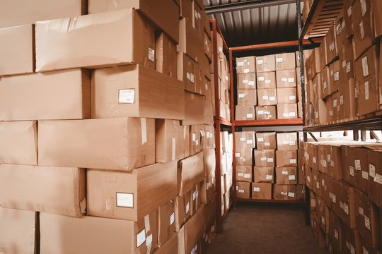 Shelves with boxes in warehouse