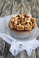 Christmas cake with caramelized nuts,chocolate and spices.