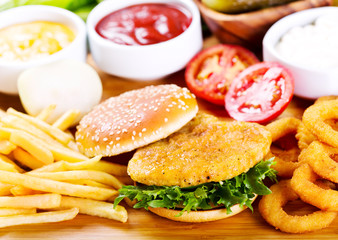 burger with chicken and fries