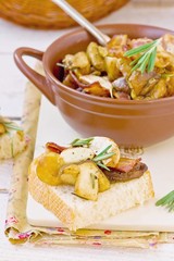 Fried cepes with bacon, garlic and rosemary