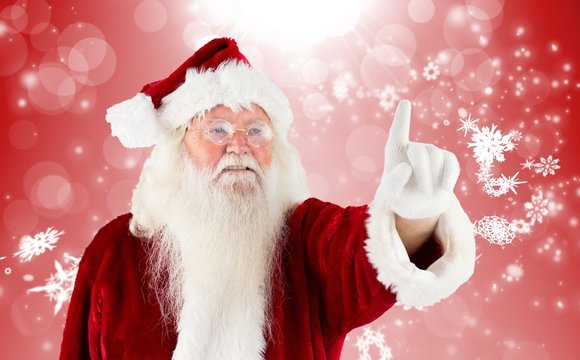 Composite image of santa claus pointing