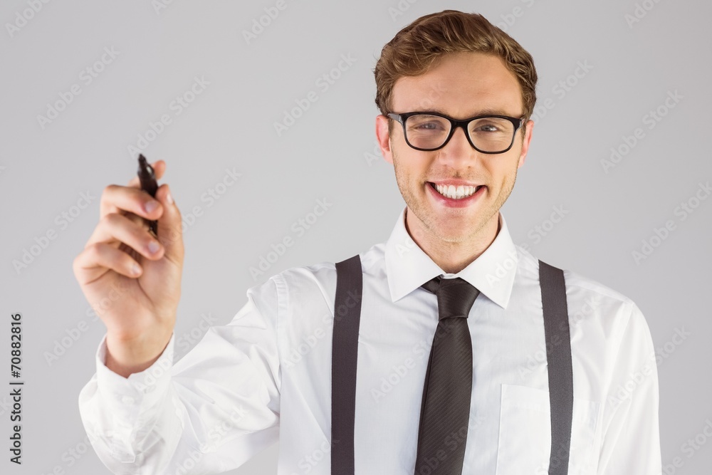 Poster geeky businessman writing with marker