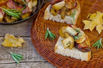 Fried cepes with bacon, garlic and rosemary