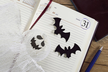 Halloween calendar with ghost and bats