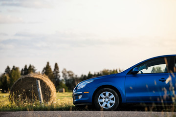 Fototapeta premium Car in a rural scene