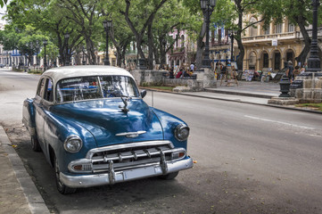 Fototapeta na wymiar Classic american old blue car in Old Havana, Cuba