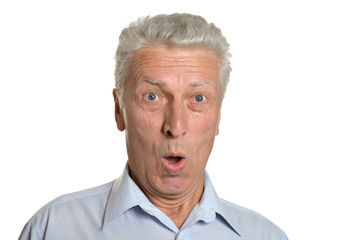 Portrait of surprised senior man