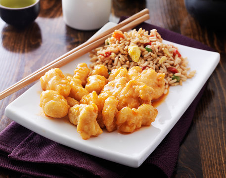 orange chinese chicken with fried rice