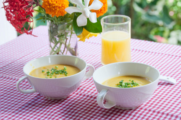 Two cups of pumpkin soup