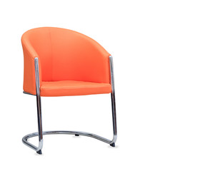 The office chair from orange leather. Isolated