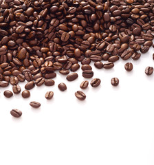 Top view of coffee beans isolated on white background