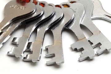 multiple keys in a red thread