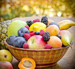Organic fruits in wicker basket