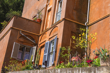 Fototapeta na wymiar Picturesque Italian home with plants on the terrace
