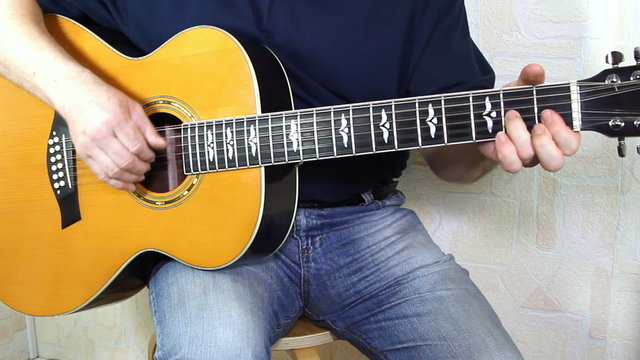 Musical instrument with guitarist hands