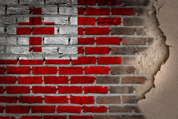 Dark brick wall with plaster - Tonga