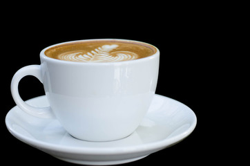 white cup of coffee isolated on black background