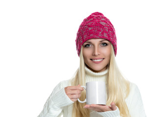 Beautiful woman holding white cup