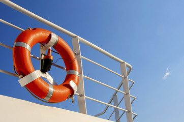 Life buoy on the deck of cruise ship