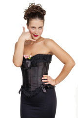 young woman making a call me gesture