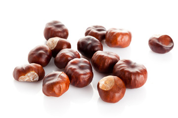 Chestnut on white background. ripe chestnuts