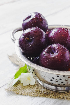 ripe washed plums