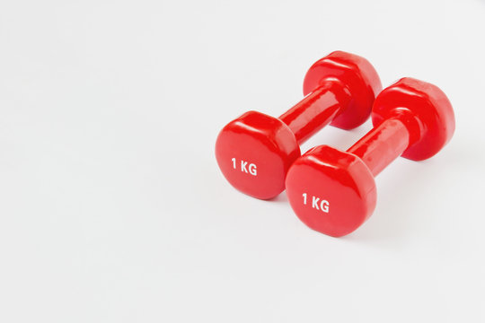 small red dumbbell