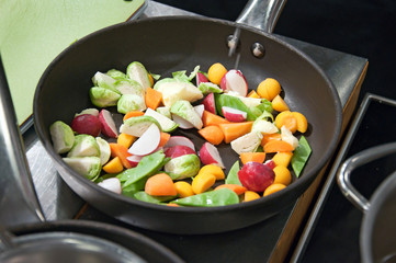 fresh vegetables on a frying pan