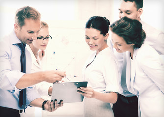 business team discussing something in office