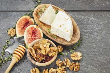 Fototapeta premium Fresh Figs with Spiced Honey and Goat Cheese.