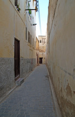 Fototapeta na wymiar Narrow street in Fes, Morocco