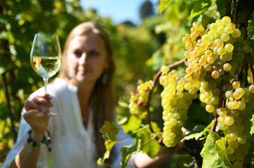 Woman tasting wine. Lavaux region, Switzerland