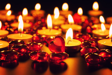 Candles and decorative red heart