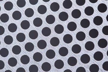 Metal background with holes