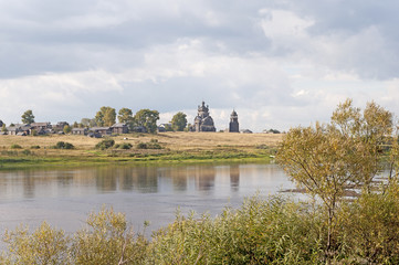 Fototapeta na wymiar North Russian village on the river