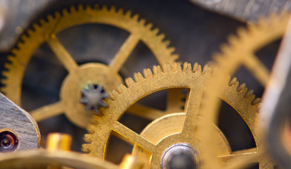 Metallic Background with metal cogwheels a clockwork. Macro