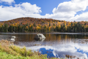 Autumn view on the lake and mountains