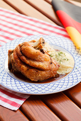 eisbein with braised cabbage and potato