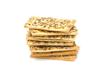 tower stack of cookies with sesame seeds isolated on a white bac