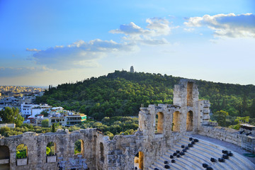 Fototapeta na wymiar Odeon Herodes Atticus And Philopappus Hill