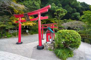 Traditional torii gate in the Japanese city park Beppu