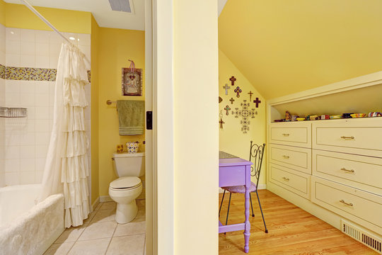 Double Kids Bathroom Interior With Storage Cabinet And Table