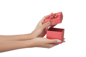 Close up hands open a red gift box