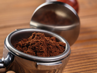 ground coffee in portafilter ready for tamping