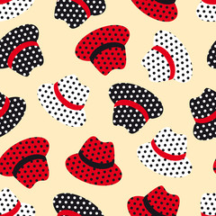Seamless pattern with red, white and black hats with polka dots