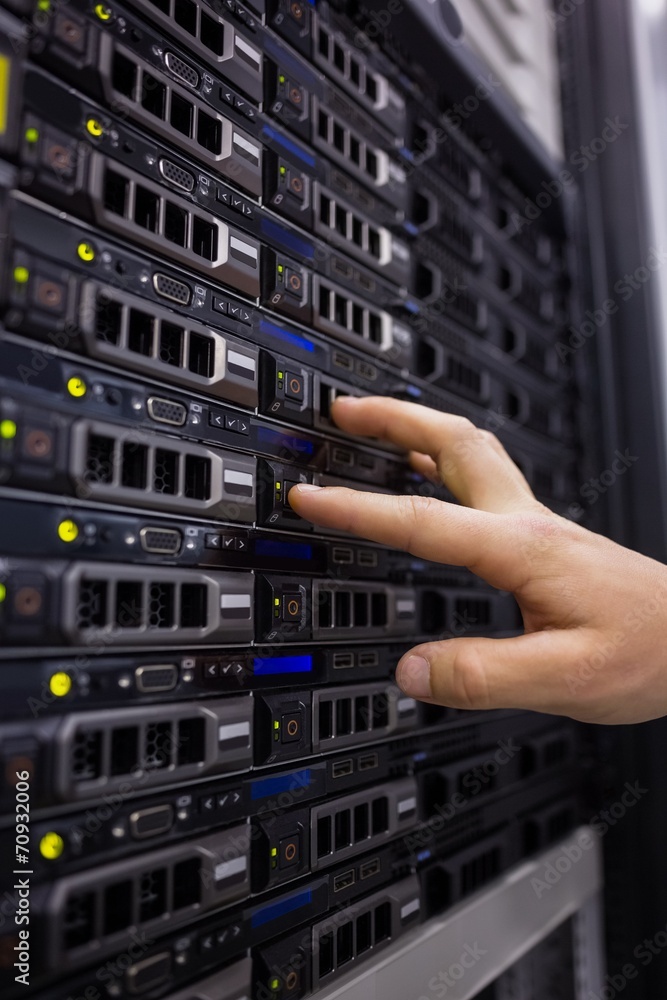 Aufkleber technician working on server tower