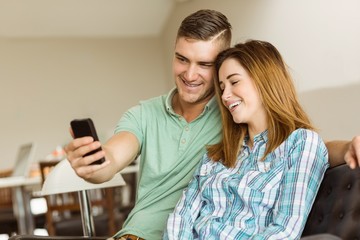Cute couple relaxing on couch