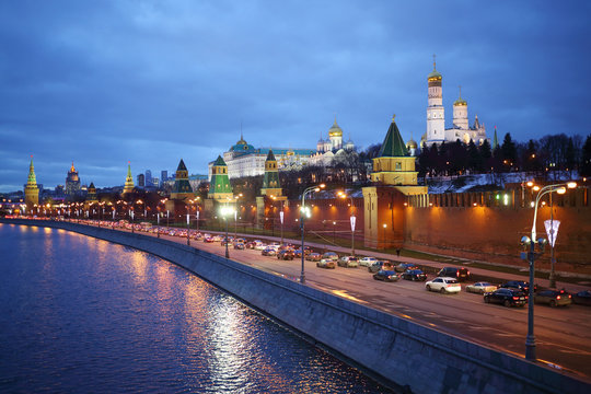 Traffic on Kremlin embankment against Ivan Great bell tower